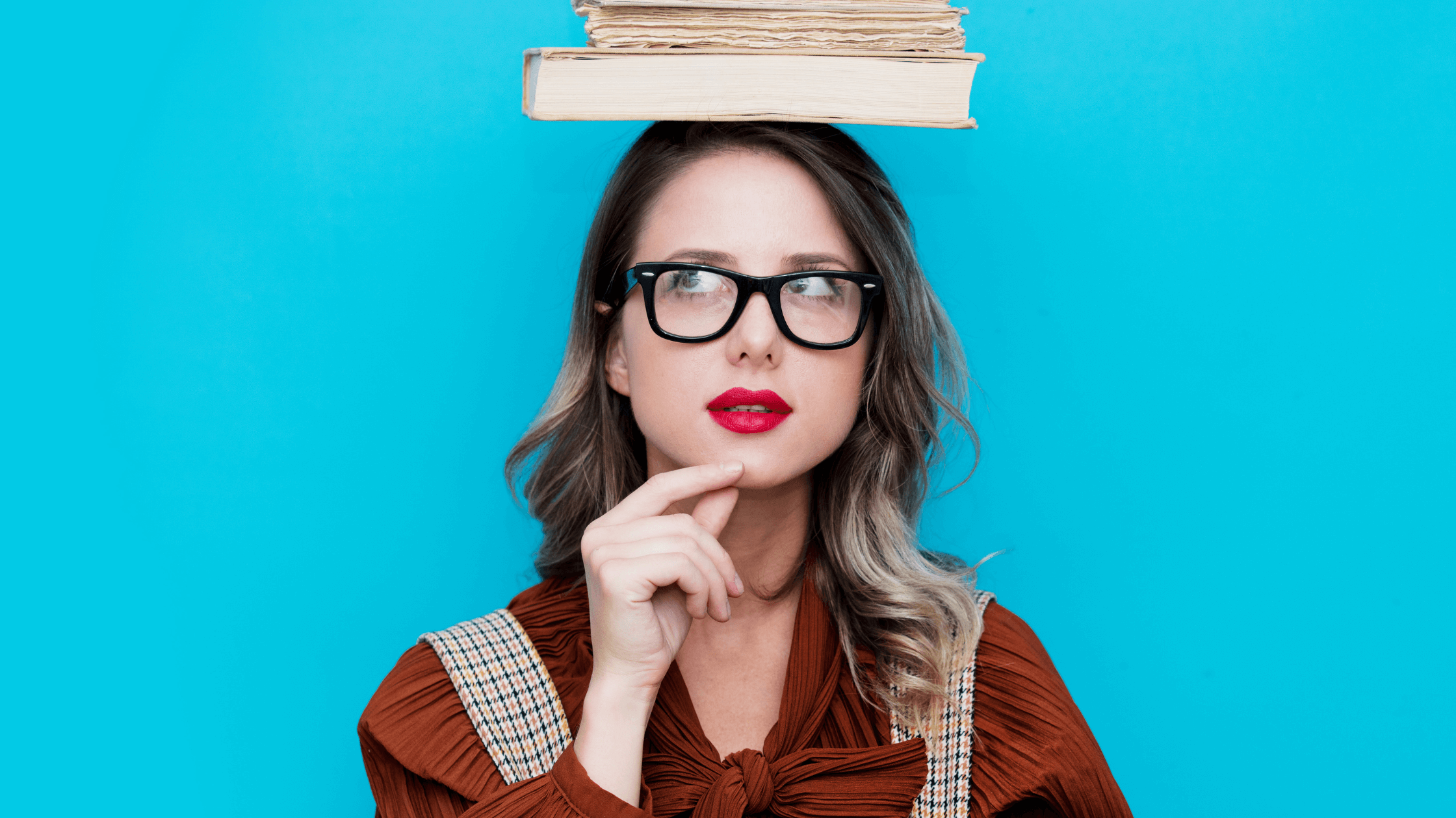 A woman balancing a book on her head and wondering how she can read more books since she's so busy.