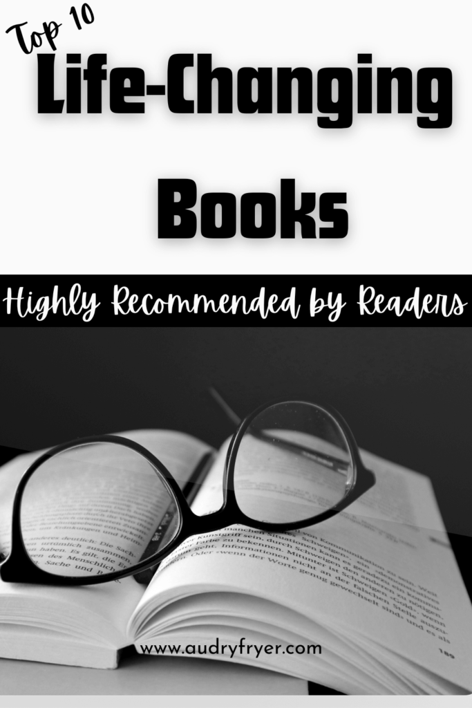 An open book with a pair of glasses on top and the title "Top 10 Life-Changing Books Highly Recommended by Readers